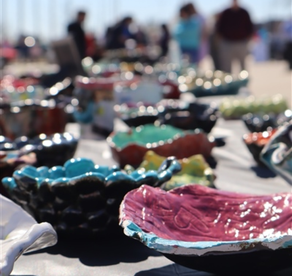 Close up photo of handmade ceramic bowls displayed on a table